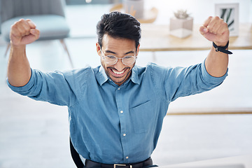 Image showing Winner, success and happy businessman in office, celebrating and excited for email, review or loan approval. Hands, celebration and corporate male online winner with emoji, wow or winning gesture