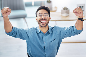 Image showing Success happy and asian businessman in office, celebrating and excited for email, review or loan approval. Hands, celebration and corporate male online winner with emoji, wow or winning gesture