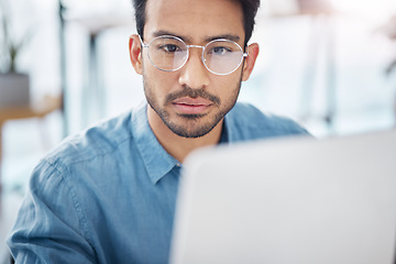 Image showing Contemplating, computer and business man in office for idea research, serious and planning. Website, technology and digital with male employee reading online for proposal, project and email news