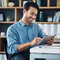 Image showing Happy asian man, tablet and smile for social media, communication or networking at office desk. Male creative designer smiling on touchscreen for digital marketing, browsing or advertising in startup