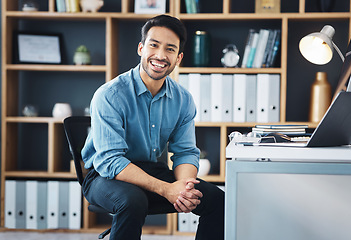 Image showing Relax, founder and portrait of entrepreneur smile and sitting in startup company office excited for the future. Young, happy and professional business man or worker feeling confident and proud