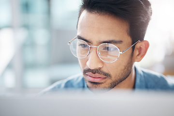 Image showing Focus, computer and business man in office for idea research, contemplating and planning. Website, technology and digital with male employee reading online for proposal, project and email news