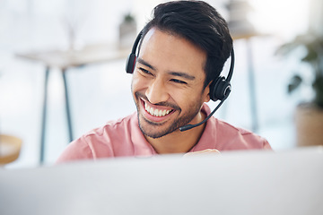 Image showing Asian man, call center and smile with headset by computer for consulting, customer service or support at office. Face of happy male consultant with headphones by PC for telemarketing or online advice