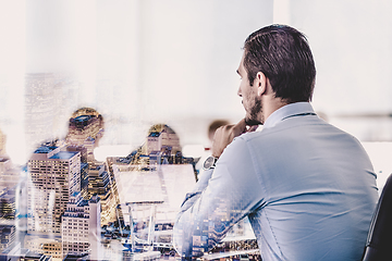 Image showing Business executive giving instructions on corporate meeting in modern office.