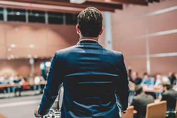 Image showing Public speaker giving talk at Business Event.