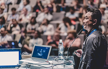 Image showing Public speaker giving talk at Business Event.