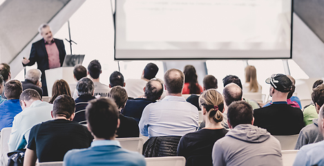 Image showing Male speeker having talk at public event.