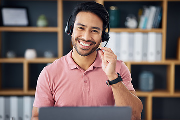 Image showing Asian man, call center and portrait smile on laptop for consulting, customer service or support at office. Happy male consultant with headphones by computer for telemarketing, help or online advice