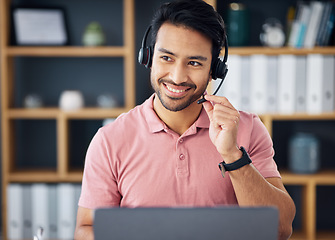 Image showing Asian man, call center and headset mic on laptop with smile for consulting, customer service or support at office. Happy male consultant with headphones by computer for telemarketing or online advice