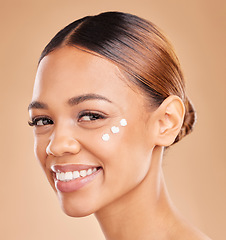 Image showing Face portrait, skincare and woman with cream in studio isolated on a brown background. Dermatology, beauty cosmetics and happy female model with lotion, creme or facial moisturizer of skin health.