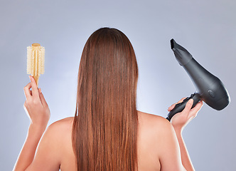 Image showing Hairbrush, model hair and back of a woman with beauty and wellness tools for soft hairstyle texture. Balayage, shampoo and keratin of a female with healthy, clean and color shine from salon in studio