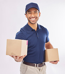 Image showing Delivery man smile, shipping box and portrait of a employee in studio with courier service. Boxes, supply chain and happiness of a export worker with distribution, online shopping and mail services