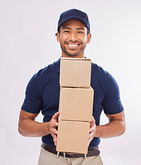 Image showing Delivery man portrait, shipping export and box of a employee in studio with courier service and a smile. Boxes, supply chain and happiness of a worker with online shopping, mail services and parcel