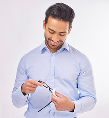 Image showing Man hands, wipe glasses and cleaning in studio with eye health, fashion lens or white background. Businessman, spectacles and cloth for clean glass, vision or eyesight with frame for eyes by backdrop