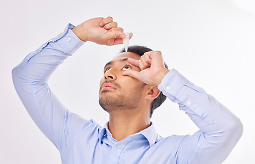 Image showing Mockup, health and Asian man with eye drops, medical product and guy against grey studio background. Japan, male and gentleman with clear eyesight, allergies and dripping solution for vision problem