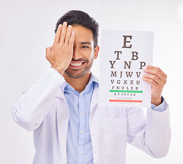 Image showing Portrait of man, doctor and eye test with smile in vision clinic, hand on face and eyesight care in India. Healthcare, wellness and happy expert optician with reading exam for eyes, health and sight.