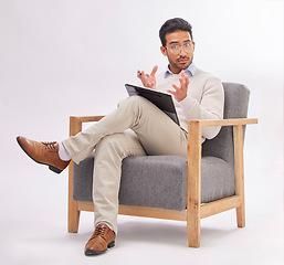 Image showing Psychology, psychologist and portrait of man on chair with clipboard in studio isolated on a white background. Therapist, consultant and male with checklist for therapy, mental health and counselling