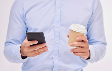 Image showing Phone, coffee and hands of business man in studio isolated on a white background. Cellphone, tea and male professional with smartphone for social media, web browsing or networking on mobile app.