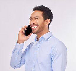 Image showing Phone call, smile and business man talking in studio isolated on a white background. Cellphone, communication and happy Asian male professional with mobile for funny discussion, speaking or chatting.