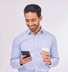 Image showing Phone, coffee and smile of business man in studio isolated on a white background. Cellphone, tea and happy male professional with smartphone for social media, web browsing or typing on mobile app.