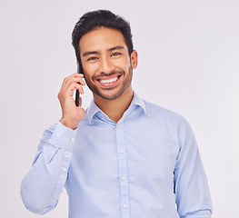 Image showing Phone call, smile and portrait of business man in studio isolated on a white background. Face, cellphone communication and happy Asian male professional with mobile for talking, speaking or chatting.