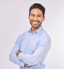 Image showing Smile, portrait and business man with arms crossed in studio isolated on a white background. Ceo, professional boss and happy, confident or proud Asian male entrepreneur from Singapore with job pride