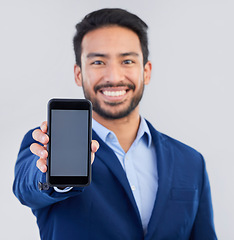 Image showing Hands, phone screen and business man in studio closeup for communication, mockup or portrait by background. Businessman, smartphone and texting on blank ux, tech or social media for chat, data and ui