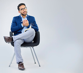 Image showing Human resources, concentration and businessman with notebook for interview process in studio on grey background. Recruiter, asian male and recruitment process, negotiation and onboarding meeting