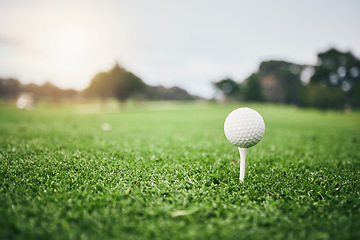 Image showing Sports, golf ball and tee on lawn in club for competition match, tournament and training. Target, challenge and games with equipment on grass field for leisure, recreation hobby and practice