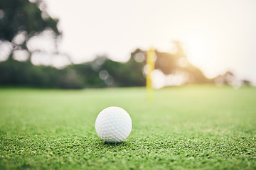 Image showing Sports, golf ball and practice on lawn of course for competition match, tournament and training. Target, challenge and games with equipment on grass field for leisure, recreation hobby and club