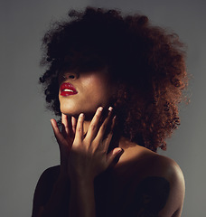 Image showing Black woman, red lipstick and shadow with beauty and makeup, hands with spotlight on studio background. Cosmetics, creative and aesthetic with beautiful female, cosmetology and art deco with manicure