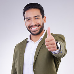 Image showing Thumbs up, success and portrait of business man smile and happy for win isolated in a studio white background. Entrepreneur, Latino and corporate employee excited, thank you and agreement sign