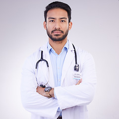 Image showing Proud portrait of man or doctor isolated on a white background for healthcare services, leadership and career mindset. Serious face of medical professional or asian person for cardiology in studio