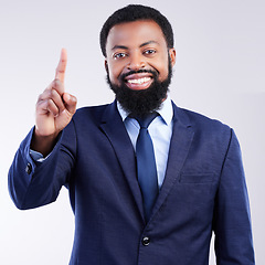 Image showing Portrait, volunteer and a business black man in studio on a gray background with his finger raised. Question, management and one with a handsome african american male executive in a corporate suit