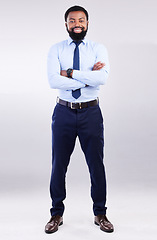 Image showing Business, studio portrait and black man smile with arms crossed in leadership, pride and motivation on white background. Happy corporate manager and confidence of management, commitment or proud look