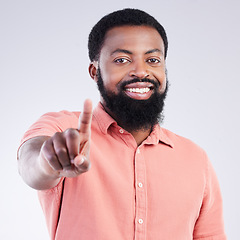 Image showing Portrait, success and black man pointing to you, winner or motivation against white studio background. Face, African American male or guy with victory, happiness or winning with joy, space or inspire