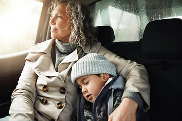 Image showing Road trip hug, sleeping child and grandma rest on travel adventure for family bonding, wellness and outdoor freedom. Sleep, driving van or relax senior woman on transport journey, holiday or vacation