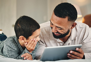 Image showing Father, son and bed with tablet for bonding, love and streaming movie on web app with happiness. Man, kid and bedroom in family home with mobile touchscreen for games, e learning and relax together