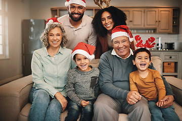 Image showing Christmas, big family and portrait smile on sofa in living room in home, bonding and care. Xmas, laughing and happy grandmother, grandfather and parents with boys or children enjoying holiday time.