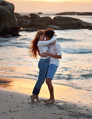 Image showing Couple hug on beach, freedom and travel, love and commitment in relationship, adventure and vacation. Trust, partnership and care with people outdoor, romance and happiness at sunset with sea waves