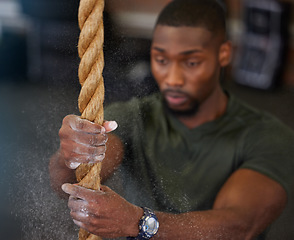 Image showing Fitness, rope and black man training, powder and exercise for endurance, balance and healthy lifestyle. Male athlete, guy and strength with workout, power and intense movement for energy and focus