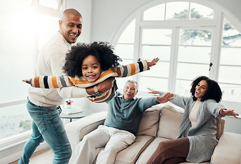 Image showing Airplane, father and girl in lounge, family an playing with love, quality time and cheerful together. Portrait, happy dad lifting daughter and granddad with mother, joyful and games in living room