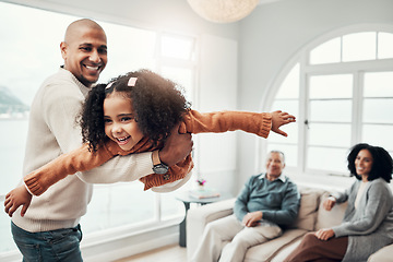 Image showing Family, flying and a father playing with his daughter in the living room of their home together during a visit. Children, energy and a man having fun with his girl while bonding in a house for love