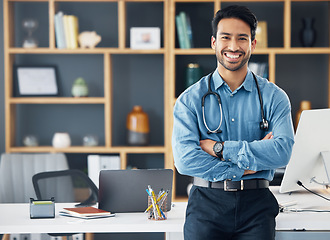 Image showing Portrait, Asian man and doctor with arms crossed, healthcare and confident in workplace. Face, Japanese male employee and happy medical professional with leadership, skills and management in office