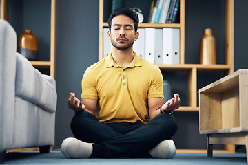 Image showing Meditation, zen and relax, man on living room floor with calm breathing exercise and time for mind wellness. Peace, balance and Indian person in lounge to meditate with concentration and mindfulness.