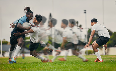 Image showing Rugby, tackle and black man with ball running to score goal on field at game, match or practice workout. Sports, fitness and motion, player in action and blur on grass with energy and skill in sport.