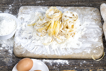 Image showing raw pasta with flour