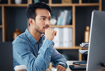 Image showing Serious, business man and thinking on computer at desk, internet research and analysis. Focused male employee, desktop and solution of ideas, planning decision and review strategy, mindset and vision