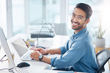 Image showing Happy business man, portrait and laptop in office for happiness, startup management and planning. Young male worker, smile and computer technology with motivation, online project and pride at desk