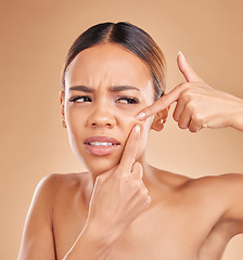 Image showing Woman pop pimple on face, acne and dermatology, skincare and facial breakout on studio background. Beauty, cosmetic care and female hands, skin outbreak and cosmetics treatment for blackheads